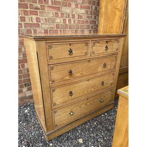 1 - An Aesthetic Movement Pollard Oak Four piece bedroom suite, consisting of a chest of five drawers, d... 