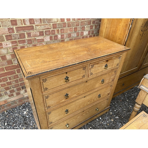 1 - An Aesthetic Movement Pollard Oak Four piece bedroom suite, consisting of a chest of five drawers, d... 