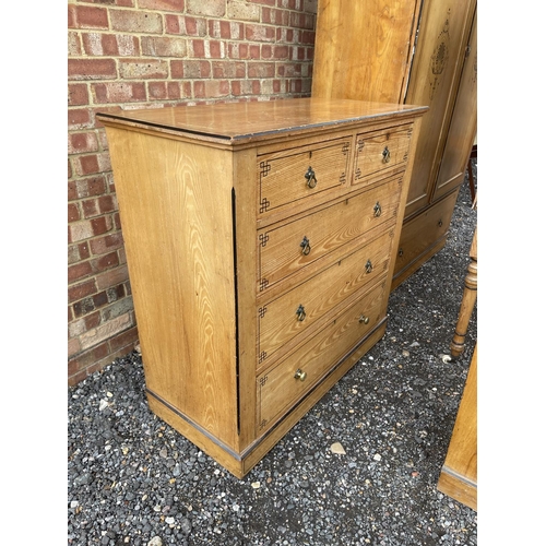 1 - An Aesthetic Movement Pollard Oak Four piece bedroom suite, consisting of a chest of five drawers, d... 