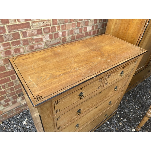 1 - An Aesthetic Movement Pollard Oak Four piece bedroom suite, consisting of a chest of five drawers, d... 