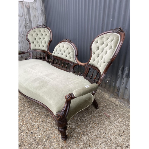 10 - A victorian chaise lounge settee with green upholstery  180cm wide