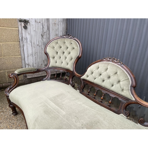 10 - A victorian chaise lounge settee with green upholstery  180cm wide