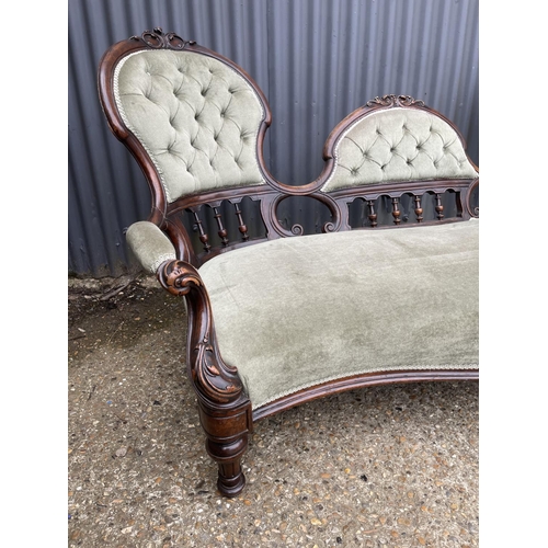 10 - A victorian chaise lounge settee with green upholstery  180cm wide