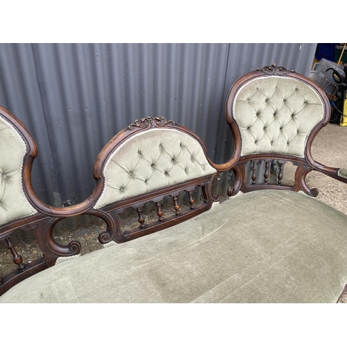 10 - A victorian chaise lounge settee with green upholstery  180cm wide