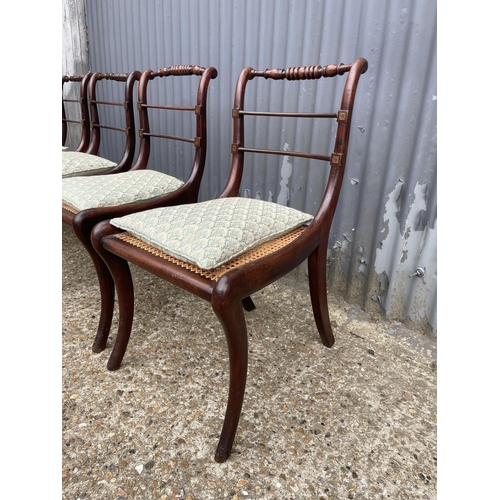 102 - A set of four victorian rosewood chairs with brass inlay and begere seat, recently refurbished