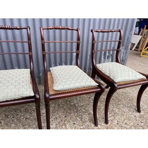 102 - A set of four victorian rosewood chairs with brass inlay and begere seat, recently refurbished