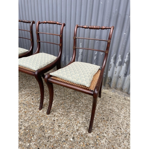 102 - A set of four victorian rosewood chairs with brass inlay and begere seat, recently refurbished