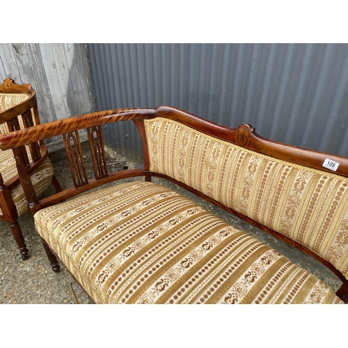 108 - An Edwardian mahogany three piece salon suite upholstered in gold