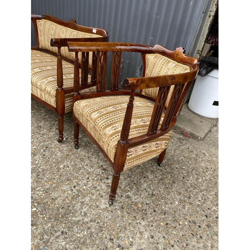 108 - An Edwardian mahogany three piece salon suite upholstered in gold