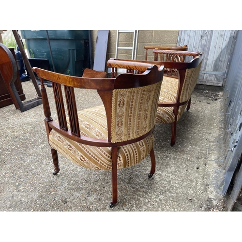 108 - An Edwardian mahogany three piece salon suite upholstered in gold