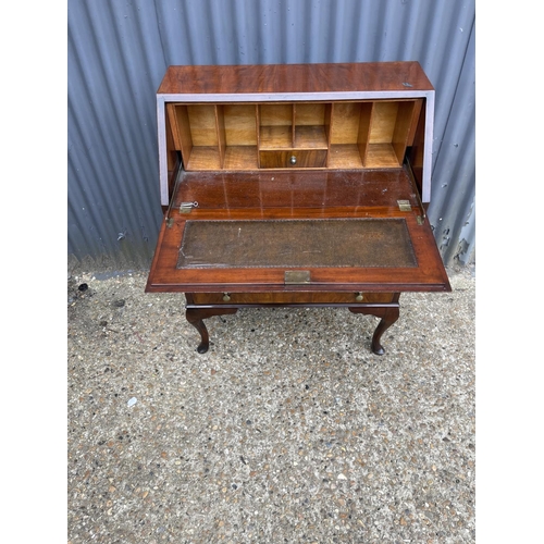 110 - An early 20th century mahogany bureau