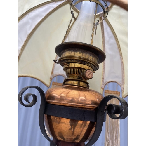 115 - A mahogany oil standard lamp 185cm high