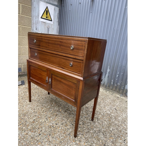 117 - An Edwardian mahogany two drawer washstand chest 100x 43x112