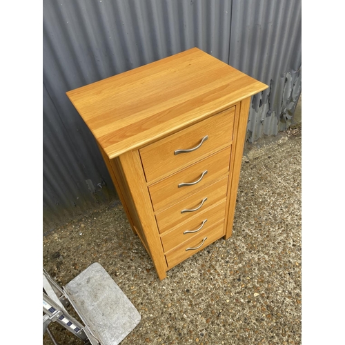 134 - A light oak tallboy chest of drawers 52x48x104