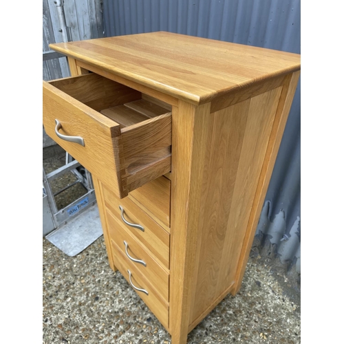 134 - A light oak tallboy chest of drawers 52x48x104