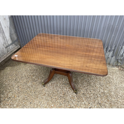 14 - A victorian rectangular mahogany tilt top breakfast table