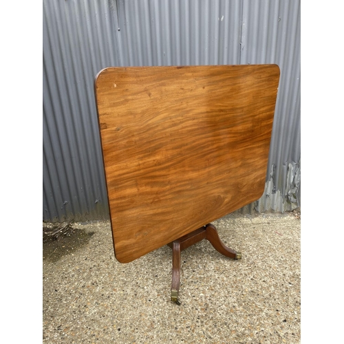 14 - A victorian rectangular mahogany tilt top breakfast table