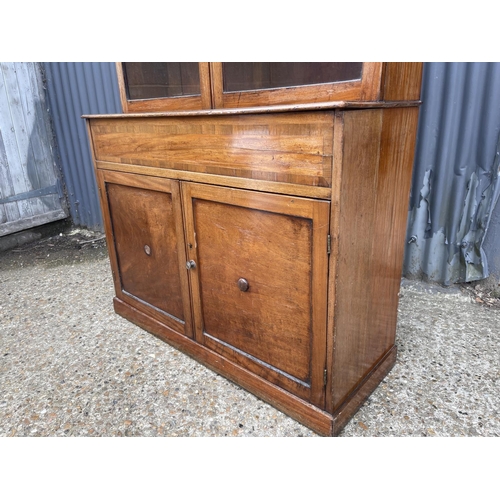 15 - A victorian mahogany bookcase cupboard 110x41x190