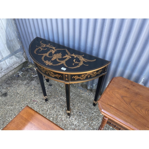 152 - A black and gold painted console table together with two other mahogany side tables