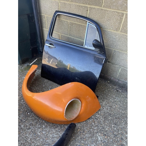 155 - A set of vintage VW beetle flared arches together with a door and another panel