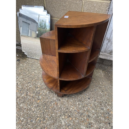 16 - A deco style walnut book table together with a frameless mirror