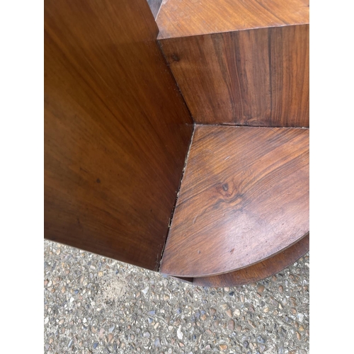 16 - A deco style walnut book table together with a frameless mirror