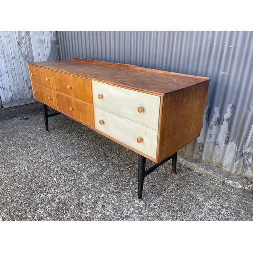 163 - A light oak mid century bank of six drawers