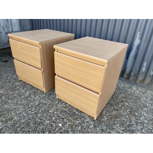 169 - A pair of ikea two drawer bedsides