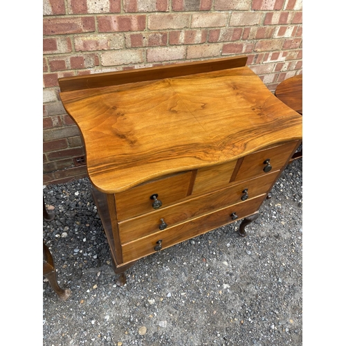 17 - A Queen Anne style walnut chest of drawers and matching dressing table