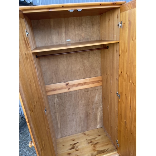 170 - A pine double wardrobe