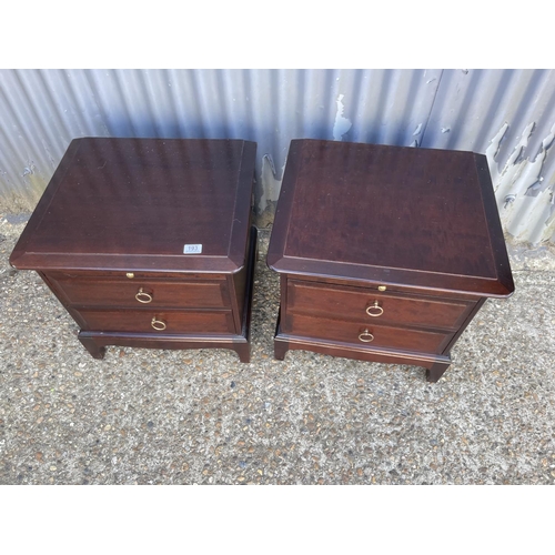 193 - A pair of stag minstrel bedside chests