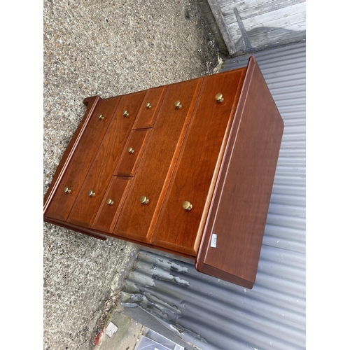 197 - A stag tallboy chest of seven drawers