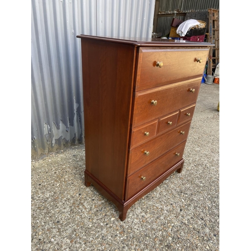 197 - A stag tallboy chest of seven drawers