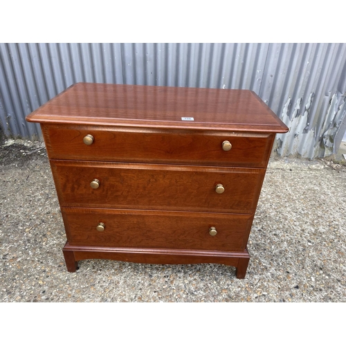 198 - A stag chest of three drawers