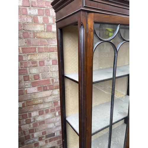 2 - An edwardian Mahogany display cabinet (One end glass missing)