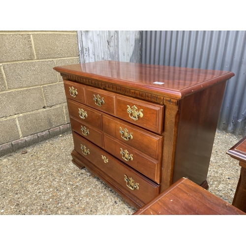 201 - A stag chest of drawers together with matching pair of bedsides