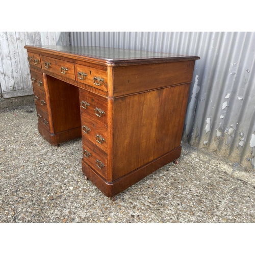 208 - A compact size Edwardian mahogany twin pedestal desk with green leather top and brass handles   103x... 