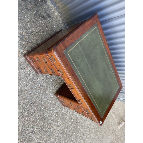 208 - A compact size Edwardian mahogany twin pedestal desk with green leather top and brass handles   103x... 