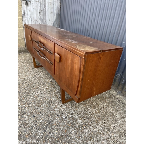 211 - A mid century teak sideboard AF to top