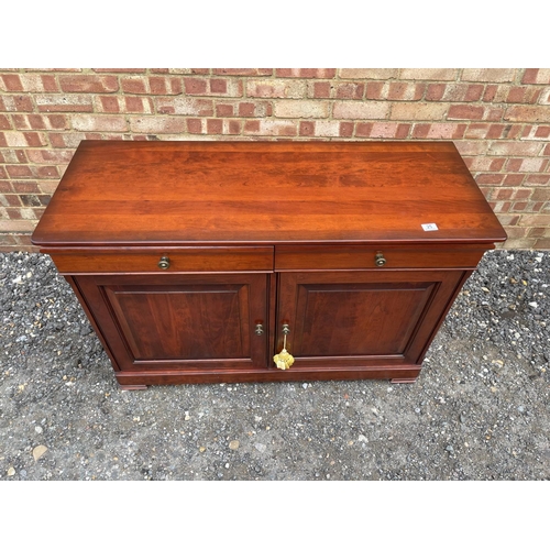 25 - A reproduction mahogany two drawer sideboard  122x48x82