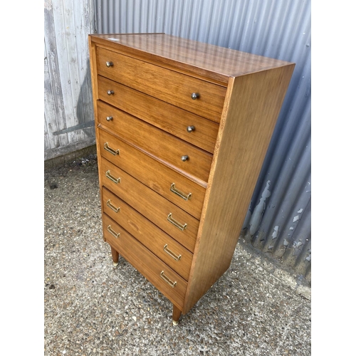 266 - A mid century tallboy chest of seven drawers