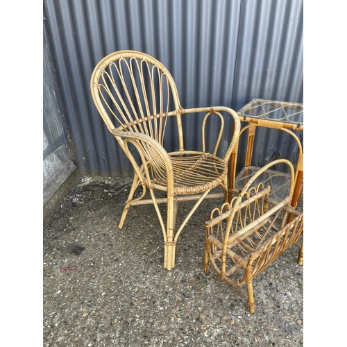 269 - Six pieces of retro bamboo furniture including chair and glass top coffee table