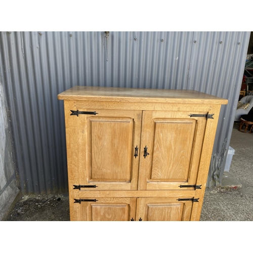 274 - A large light oak four door house keepers cupboard 115x50x145