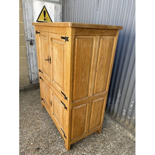 274 - A large light oak four door house keepers cupboard 115x50x145