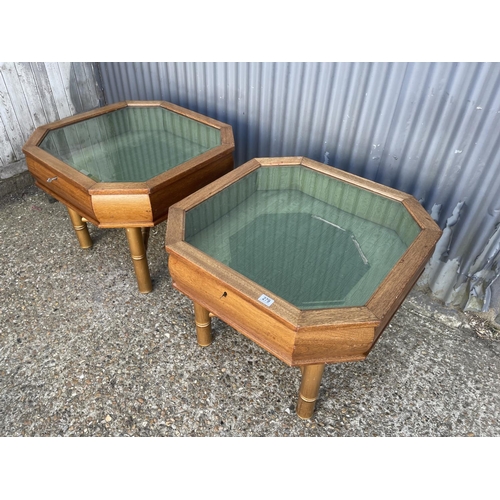 279 - A pair of mahogany collectors cabinets raised on wooden legs, both with key 80x80x64