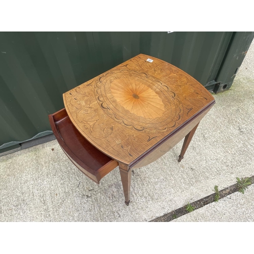 286 - An inlaid mahogany drop leaf occasional table with drawer