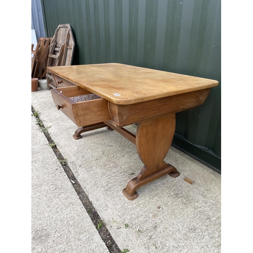 295 - A victorian mahogany three drawer writing table 130x75x74