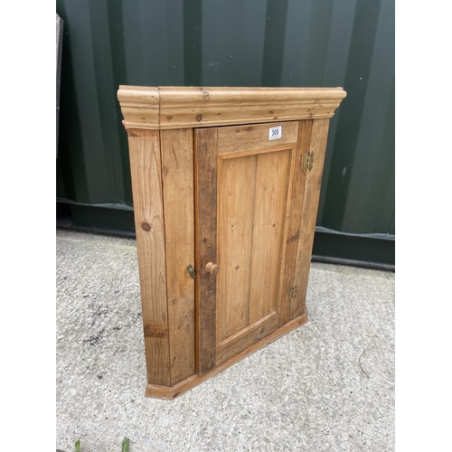 300 - A COUNTRY PINE WALL HANGING CORNER CUPBOARD