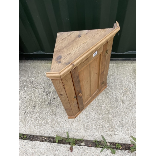 300 - A COUNTRY PINE WALL HANGING CORNER CUPBOARD