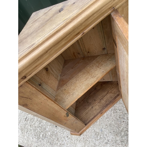 300 - A COUNTRY PINE WALL HANGING CORNER CUPBOARD